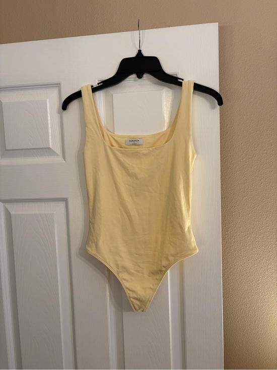 Babaton Tops - Babaton (Aritzia) Butter YellowOne-Piece Bodysuit